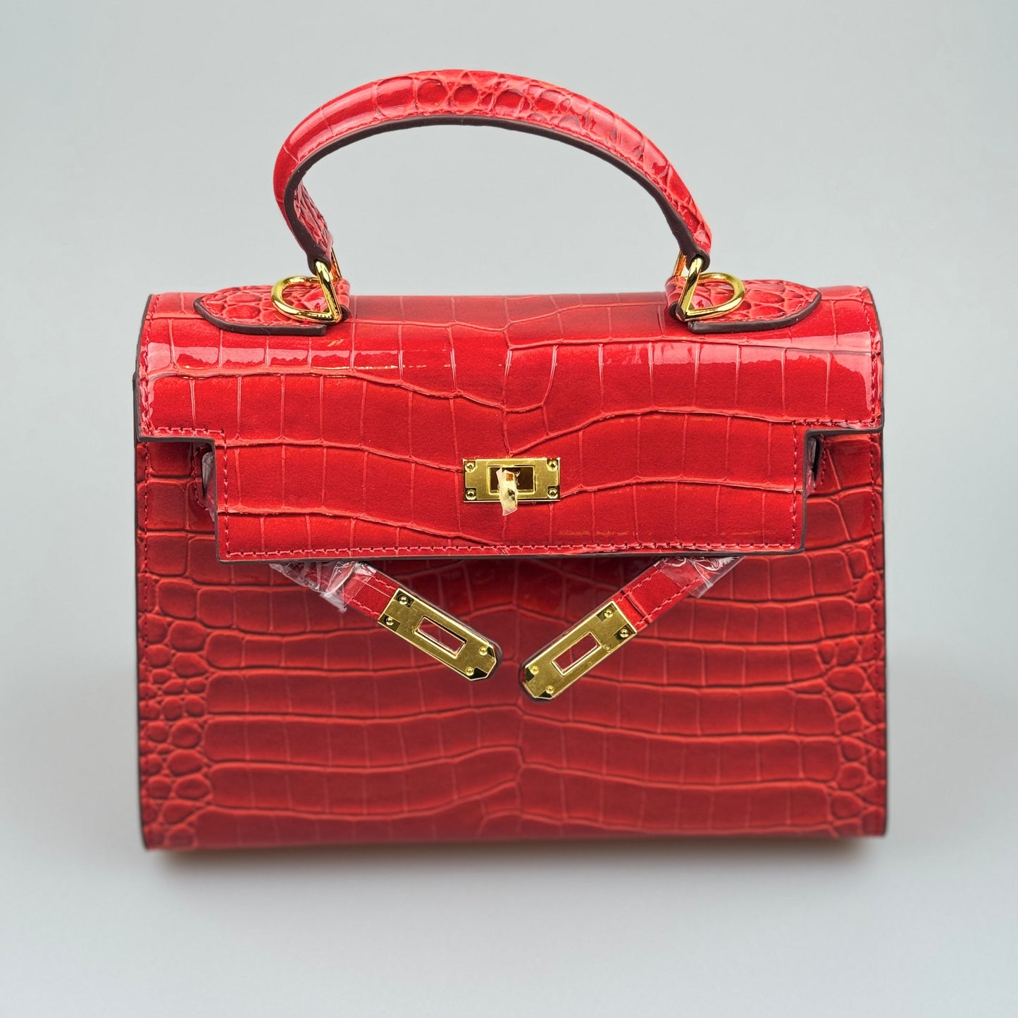 Mala estilo Kelly em pele genuína - Textura Croco