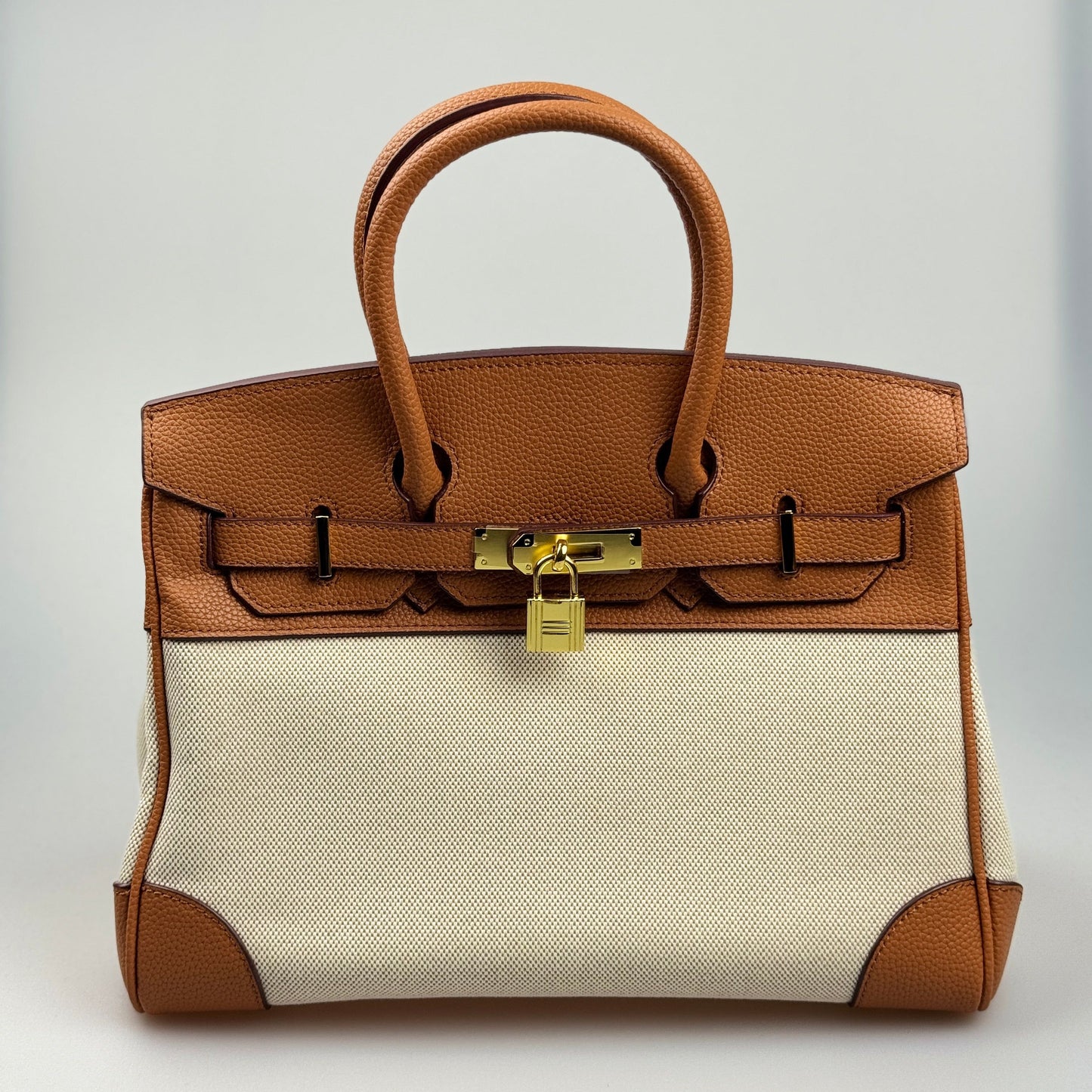 Mala Estilo Birkin em Tela e Pele Genuína – Luxo Estruturado com Fecho Elegante