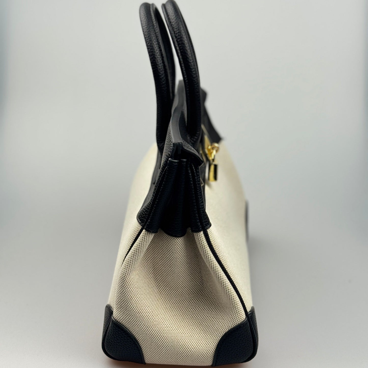 Mala Estilo Birkin em Tela e Pele Genuína – Luxo Estruturado com Fecho Elegante