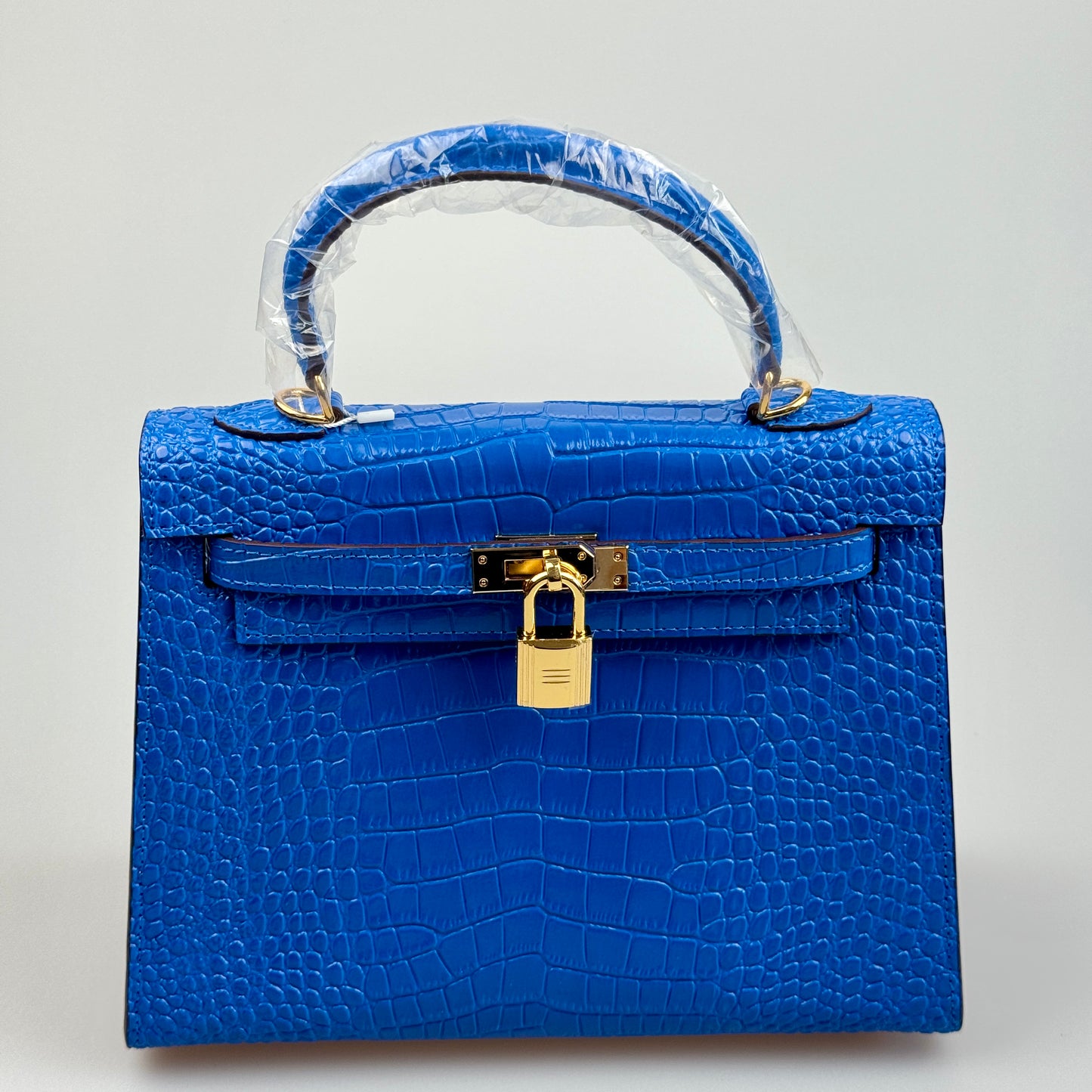 Mala estilo Kelly em pele genuína - Textura Croco