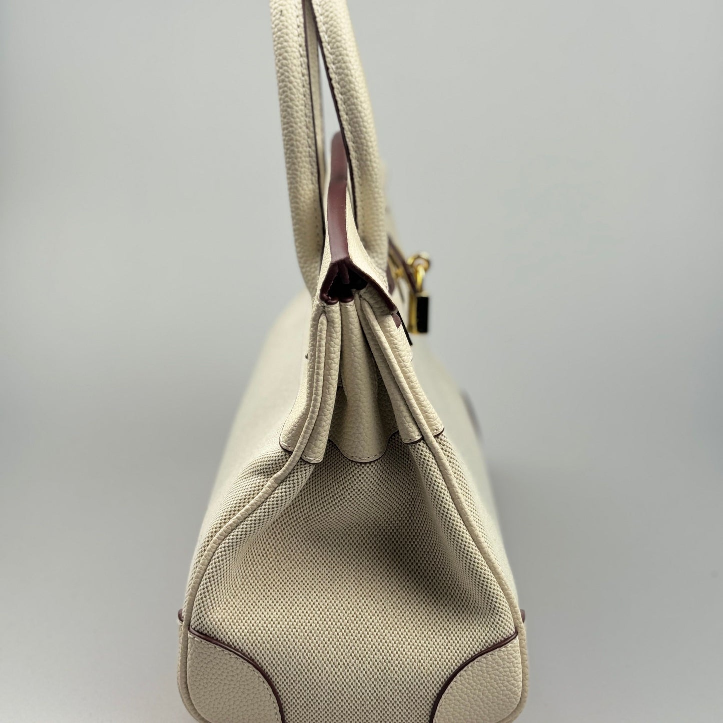 Mala Estilo Birkin em Tela e Pele Genuína – Luxo Estruturado com Fecho Elegante