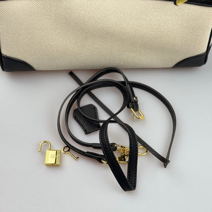 Mala Estilo Birkin em Tela e Pele Genuína – Luxo Estruturado com Fecho Elegante