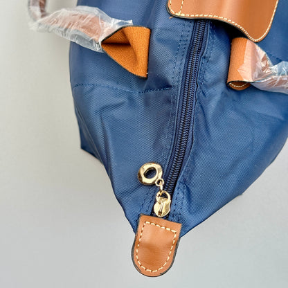 Mala Dobrável Parisienne – Nylon Resistente e Alças em Pele Sintética