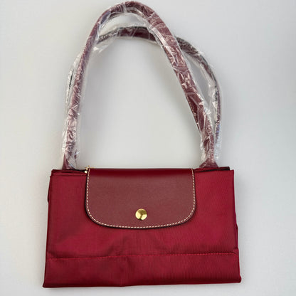 Mala Dobrável Parisienne – Nylon Resistente e Alças em Pele Sintética