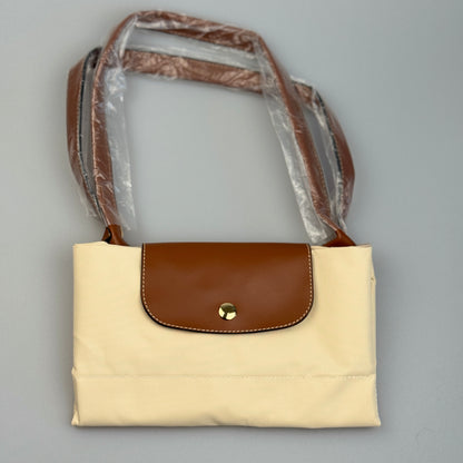 Mala Dobrável Parisienne – Nylon Resistente e Alças em Pele Sintética