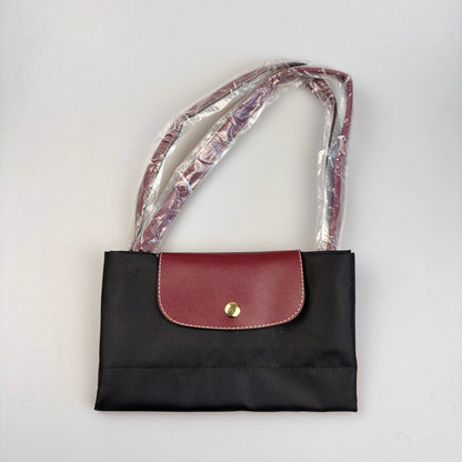 Mala Dobrável Parisienne – Nylon Resistente e Alças em Pele Sintética