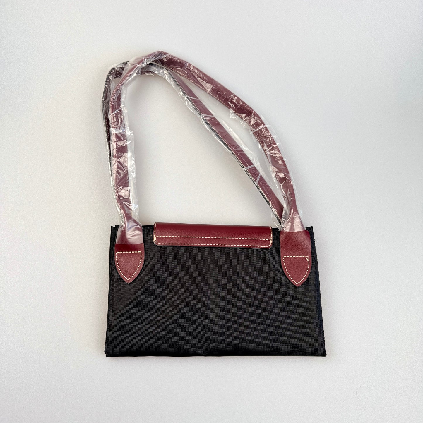 Mala Dobrável Parisienne – Nylon Resistente e Alças em Pele Sintética